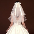 Short white double-layered bridal veil with ribbon bow made of soft tulle material - White Ribbon Bow Double Layer / Alloy Hair Comb
