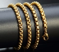 Dettaglio macro di una catena veneziana dorata con chiusura a moschettone lucida - Catena Veneziana Dorata (3,0 mm * 60 cm)