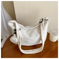 Detail of beige corduroy half-moon crossbody bag with a round detachable coin purse - White
