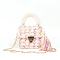 Detail of handmade knit mini bag with purple and orange weave and gold tassel clasp - Purple Orange White Patchwork
