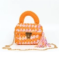 Detail of handmade orange woven handbag with colorful fringe and gold metal clasp - Orange Purple Mixed