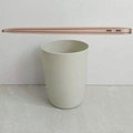 Minimalist light green matte plastic toothbrush cup shown in a creative studio setting - 350ml / Light Gray