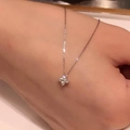 Elegant silver S925 four-leaf clover pendant necklace with cubic zirconia on a model - 925 Silver / Silver-White 45cm Adjustable