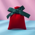 Red velvet drawstring jewelry pouch with a dark green ribbon bow for gift packaging - Red And Green Ribbons; 10*12