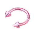 Detailed macro view of pink horseshoe nose ring with sharp cone spikes on both ends - Pink