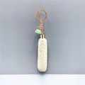 Gray faux fur tassel keychain with mint green fringe and golden hardware accessories - Green
