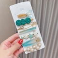 Detail of 7-piece pearl hair clip set with mermaid tail and starfish designs - 7pcs Set-Gradient Green Style