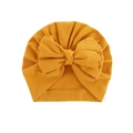 Soft ginger yellow cotton baby turban hat featuring a large decorative center bow knot - Turmeric