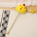 Cute yellow chicken plush massage hammer with long wooden handle on a woven mat - 35cm (Massage Stick) / Little Yellow Chick