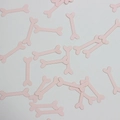 Pink bone-shaped confetti scatter pieces for Halloween party decoration on white base - Pink Bone