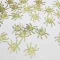 Golden glitter spider confetti for Halloween party decoration on white background - Gold Spider