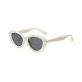 Retro ivory white cat-eye sunglasses with dark lenses for a trendy street style look - Beige Frame Black Gray Lens