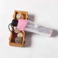Detail of compact pink mini folding umbrella with black handle in a clear protective case - Manual/Three-fold / Standard Pink