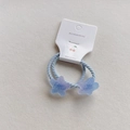 Light blue elastic hair tie with frosted gradient star charms on display card - Blue Star Hair Tie