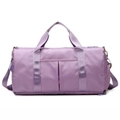 Large purple travel bag with waterproof nylon fabric and adjustable shoulder strap - Purple