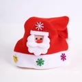 Detailed view of red Christmas hat with plush Santa appliqué and colorful snowflakes - Adult Non-Glow Santa