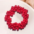 Elegant red pearl hair tie with elastic beads for ponytail styling and wrist wear - Red