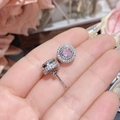 Macro shot of circular pink gemstone earrings with 18K gold plating and pave diamonds - 0245 Pink Round Pave Setting Studs