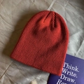 Vibrant orange knit beanie with thick ribbed texture for winter warmth on gray background - Elastic / Burgundy