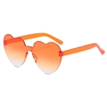 Trendy heart-shaped rimless sunglasses featuring orange gradient lenses and transparent frames - Two-tone C25