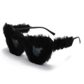Detail view of heart-shaped sunglasses with plush black fur trim and dark lenses - Black Frame Black Fur