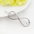 Elegant silver infinity symbol hair clip with polished metallic finish on white background - Silver Infinity