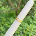 Detailed close-up of 18K gold plated ring featuring a heart-shaped zircon on a finger model - Heart Solitaire Style (1)