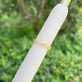Macro detail of 18K gold plated ring featuring heart-shaped cubic zirconia and pearls - Multiple Heart Zircon Style (2)