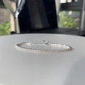 Detailed macro view of S925 sterling silver tennis bracelet with cubic zirconia row - 925 Silver / Sterling Silver Color