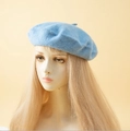 Classic light blue cashmere wool beret hat for women on a display head stand - One Size / Sky Blue