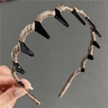 Cerchietto in tessuto oro champagne con denti e struttura ondulata antiscivolo - Kaki