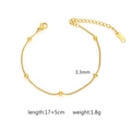 Detail of golden bead bracelet featuring five 3.3mm beads and lobster clasp with extender - Beaded Chain Style (B-015) / Gold