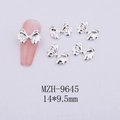 Macro shot of silver metal bow nail charms with 14x9.5mm dimensions for DIY nail art - Silver Bowknot-9645
