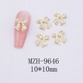 Detail of 10x10mm golden alloy bow nail charms with textured finish for DIY manicure art - Gold Bowknot-9646