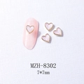 Vista macro de dijes para uñas con forma de corazón jaspeado 7x7mm y bordes metálicos - 8302 Borde Dorado Mármol Rosa (7*7mm)