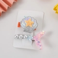 Detalle de pinzas para el pelo de concha y sirena con perlas y estrellas de mar - Juego rosa