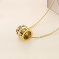 Macro shot of gold cylinder pendant with Roman numerals and crystals on snake chain - Shell Inlaid Style (KN237967-GC) / Shell Inlay Gold Color