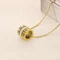 Macro shot of gold Roman numeral necklace with crystal-encrusted rings on plain background - Roman Numeral Cylindrical Style (KN237968-GC) / Gold