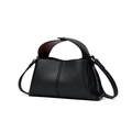 Close-up of black litchi pattern leather handbag with golden hardware and shoulder strap - Black