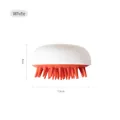 White scalp massager brush with soft orange silicone bristles for hair washing - White
