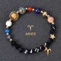 Macro detail of Aries zodiac bead bracelet with natural obsidian and planetary stones - Aries
