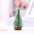 Miniature faux pine Christmas tree with snow frosting on a natural wood base - 10cm Pine Tree