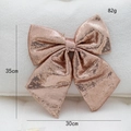 Sparkling rose gold sequin Christmas tree bow ornament, dimensions 30cm by 35cm - Large Champagne