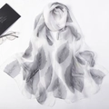 Elegant white chiffon long scarf featuring grey leaf prints and soft drapes for women - Multicolor Leaf Grey