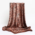 Elegant leopard print satin silk scarf in brown and black with smooth glossy texture - Coffee Leopard