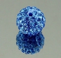 Close-up of blue Shamballa clay bead with sparkling rhinestones for DIY jewelry making - Pale Blue
