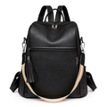 Detail of black pebbled PU leather backpack with tassel charm and striped strap - Black