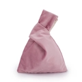 Detailed shot of pink velvet knot handbag with soft fabric texture and triangular shape - 22*31cm / Lotus Pink