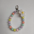 Detail of macaron color acrylic beads and white resin flower with silver spring clasp - Multicolor Beads White Flower