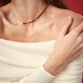 Minimalist red bead and rice freshwater pearl necklace shown on a model's neck - Red and White Spliced Pearl Fine Chain Style (W-e-020)